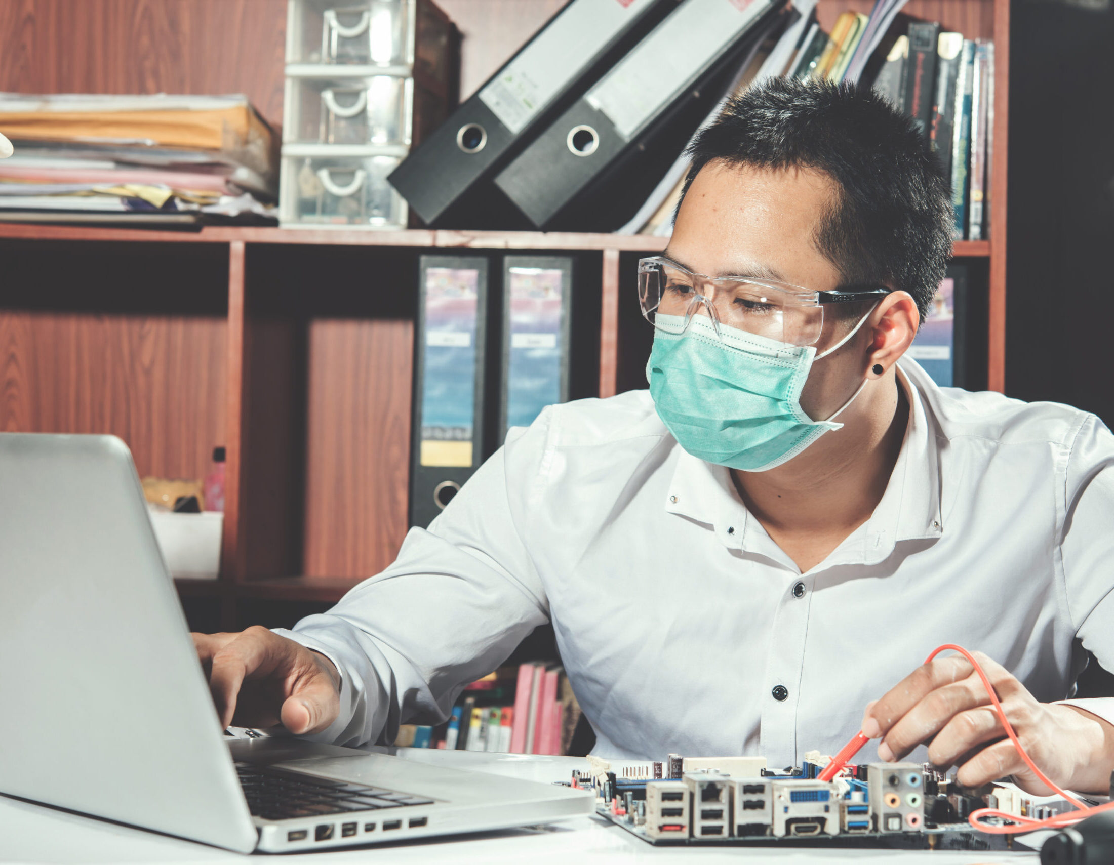 The technician repairing the computer,computer hardware, repairing, upgrade and technology